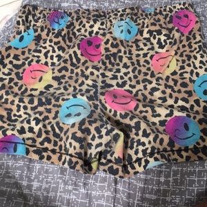I’m selling some grey shorts, smiley face shorts